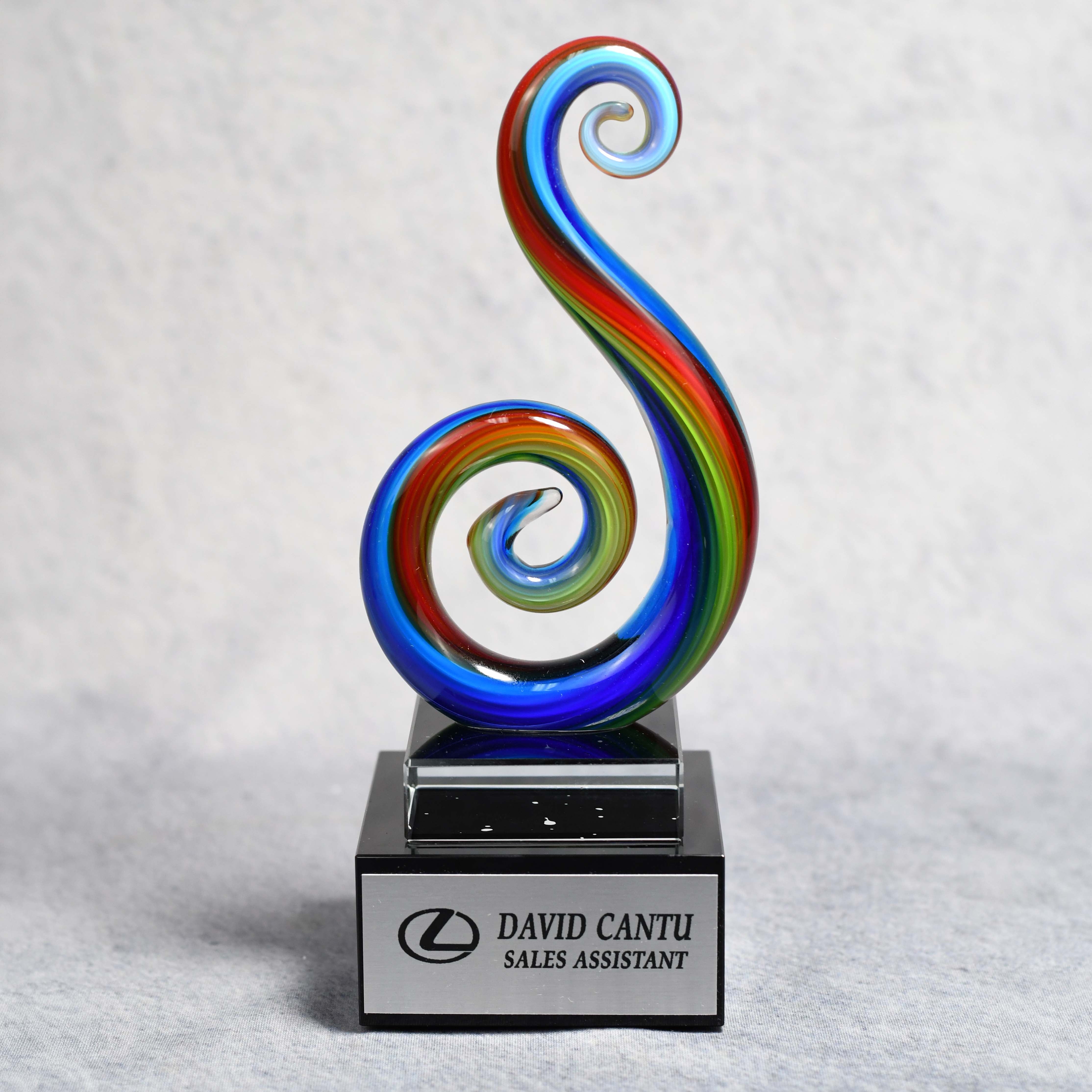 Art Glass Multi Color Curley Que on Clear Glass Base
