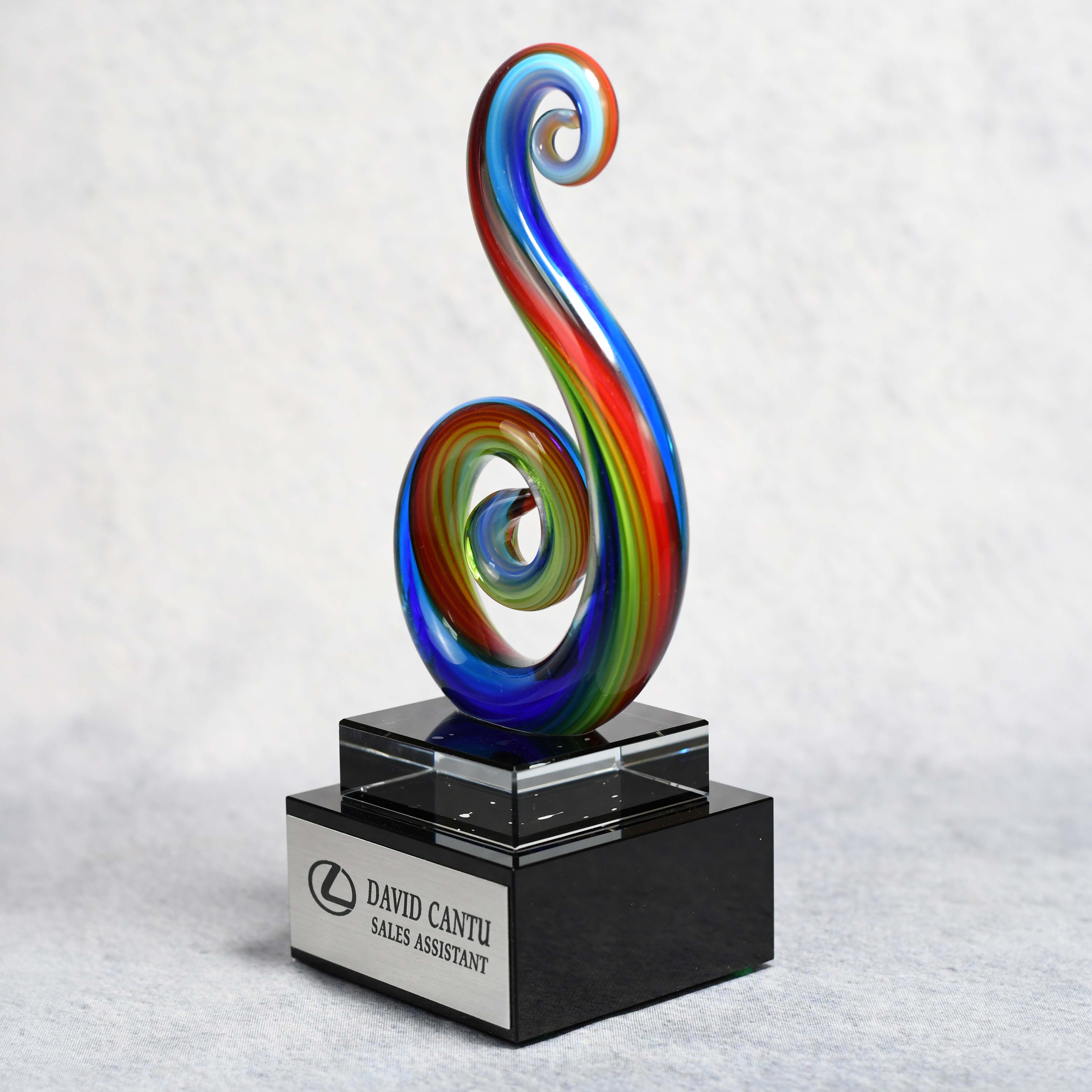 Art Glass Multi Color Curley Que on Clear Glass Base