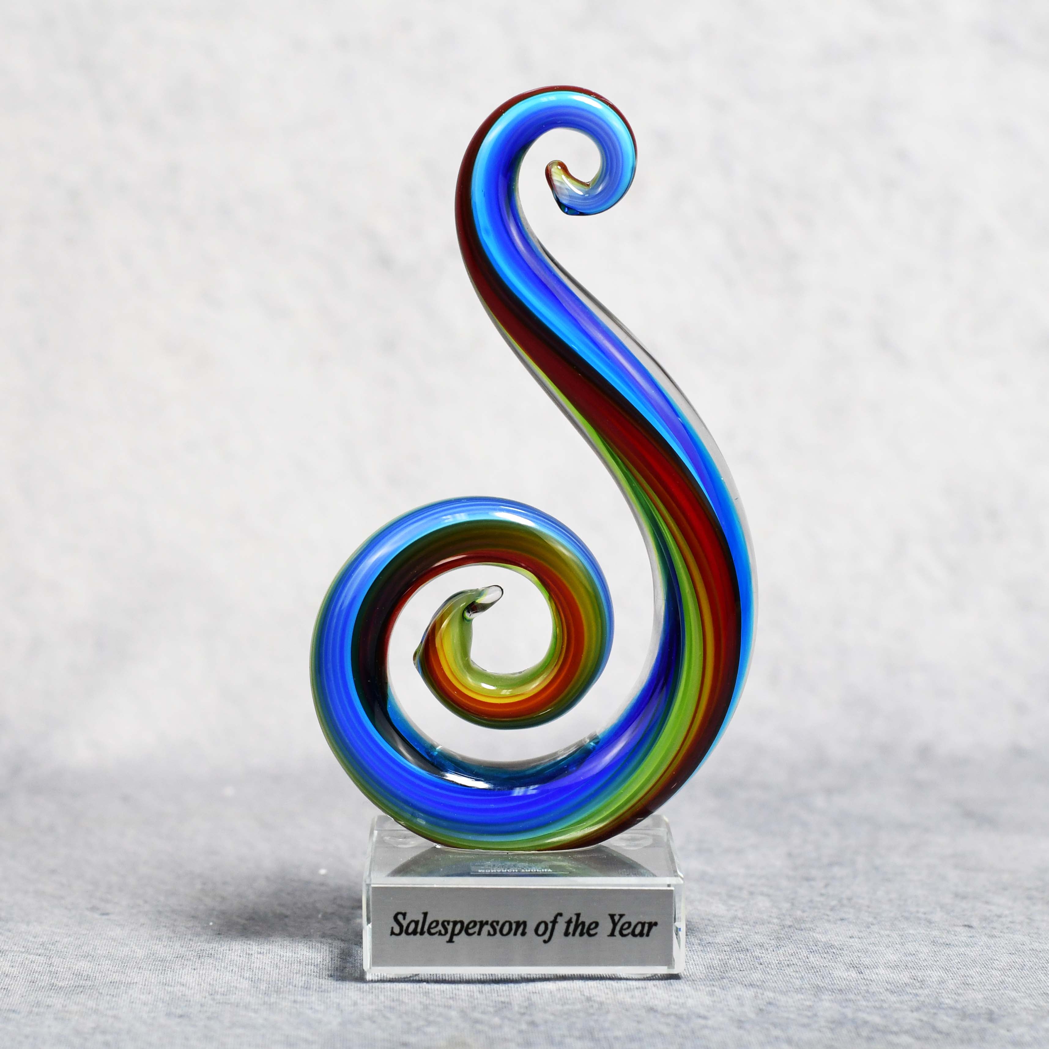 Art Glass Multi Color Curley Que on Clear Glass Base