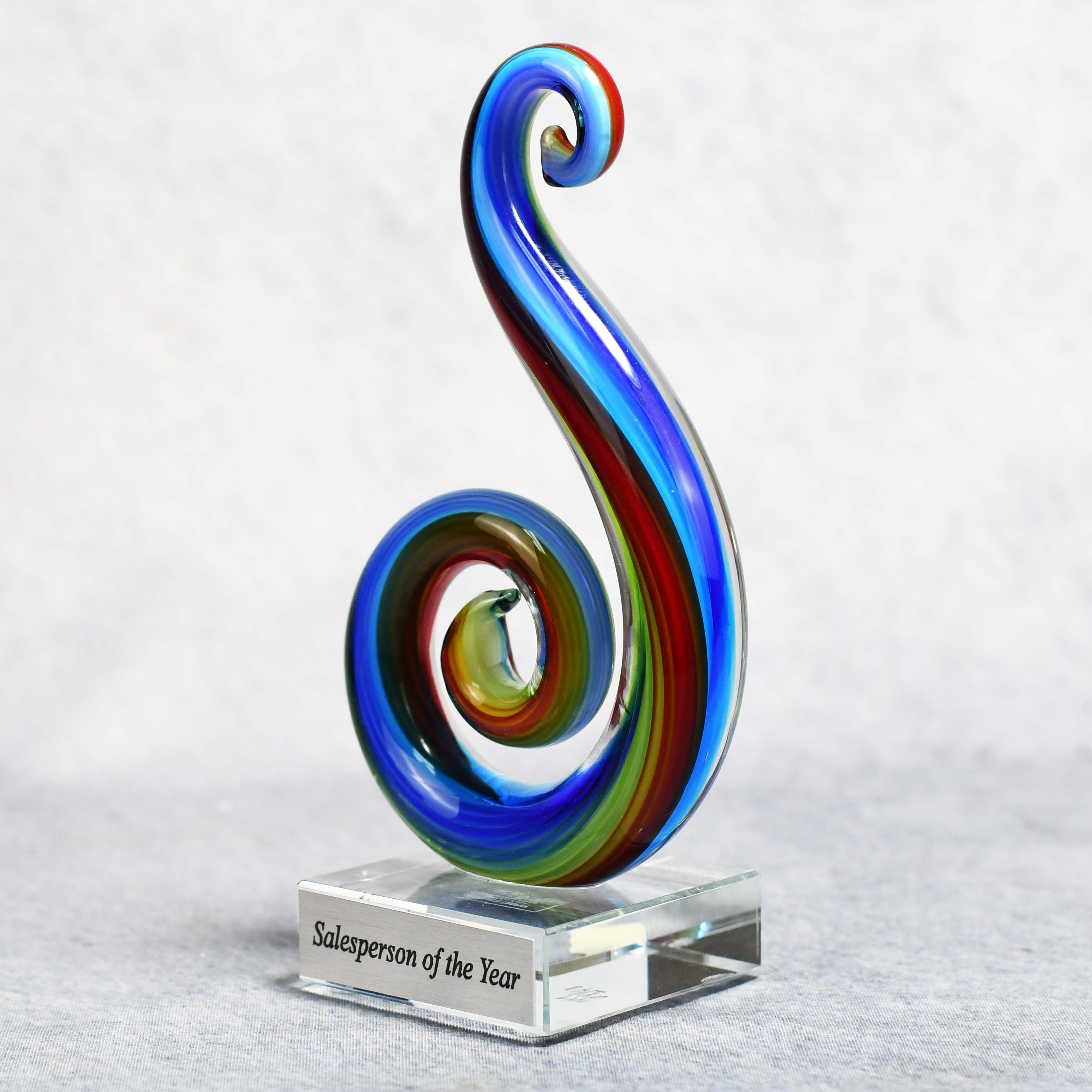 Art Glass Multi Color Curley Que on Clear Glass Base