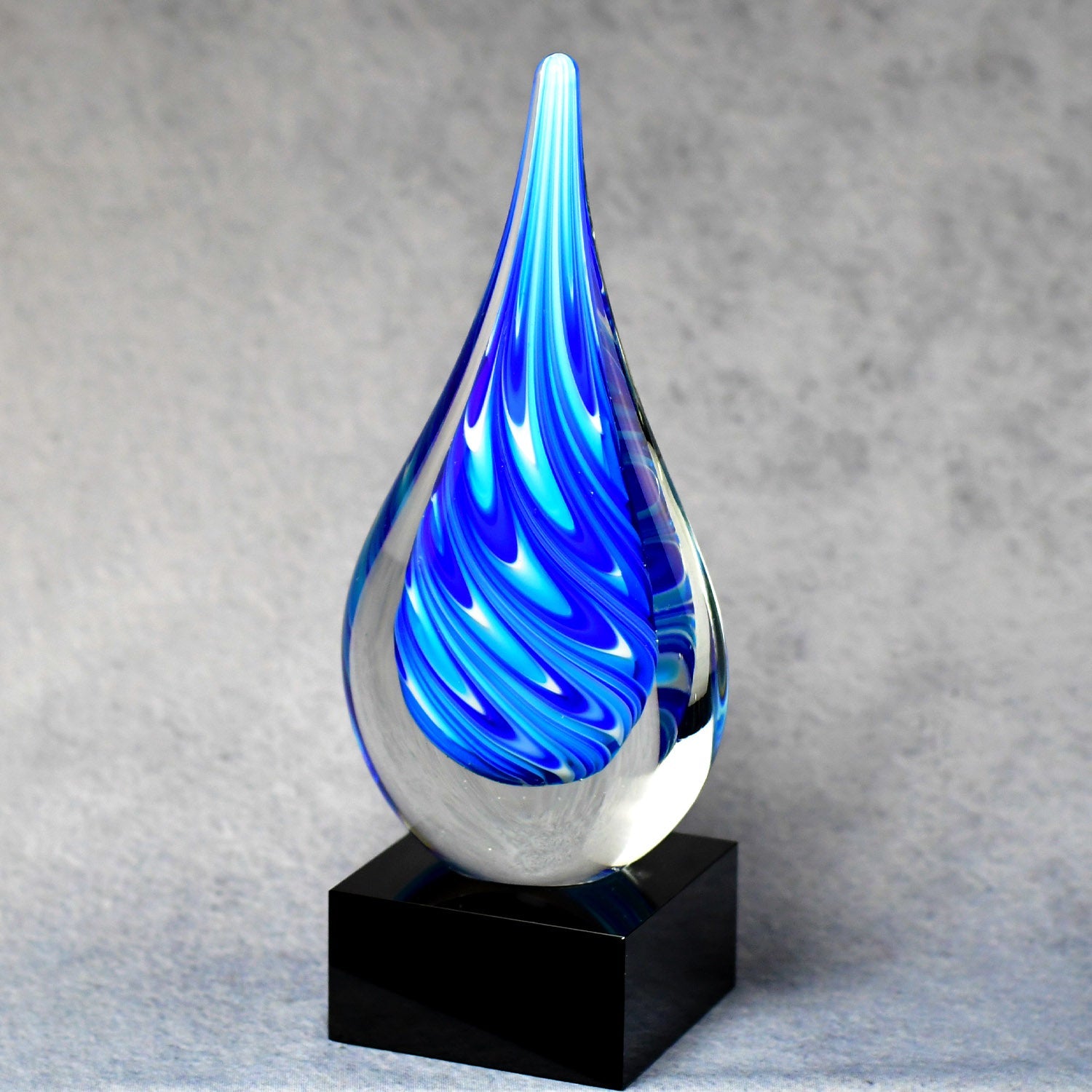 Blue/White Teardrop on Black Glass Base - Monarch Trophy Studio